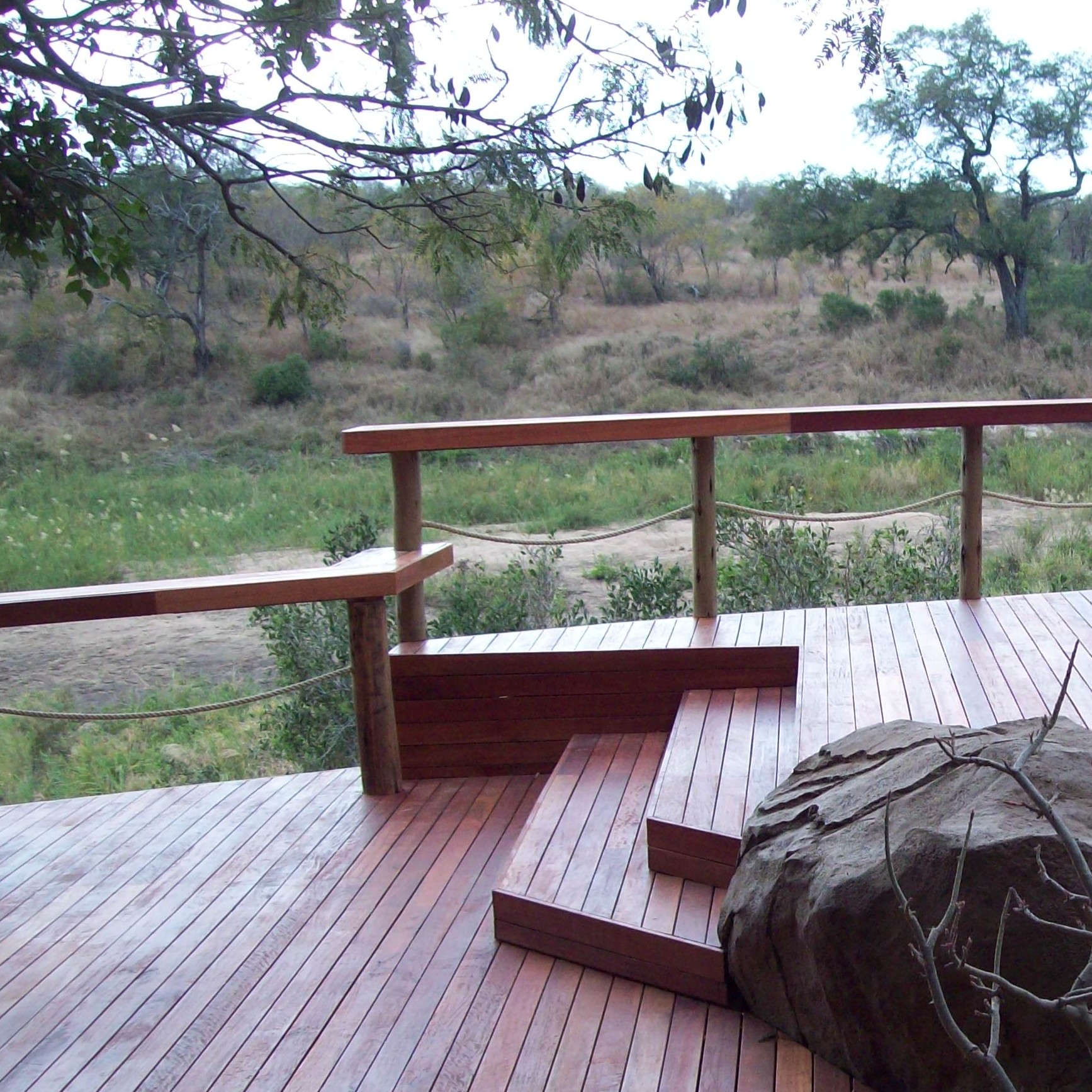 Timber steps on deck with handrail